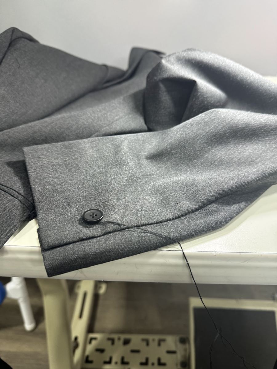 A suit jacket sleeve after alteration